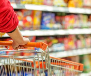 Someone pushing a trolley in a supermarket